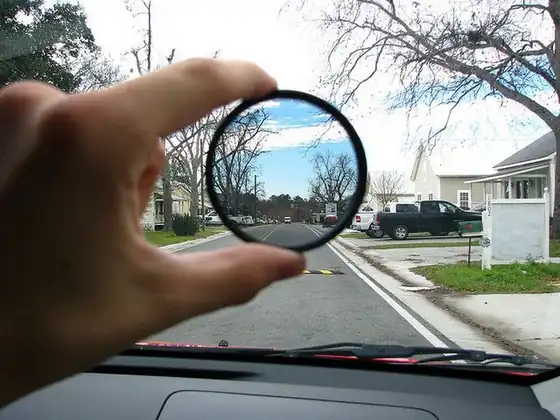 Real 52mm filter glass in front of a phone camera